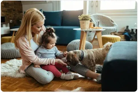 A family relaxing at home with their pets