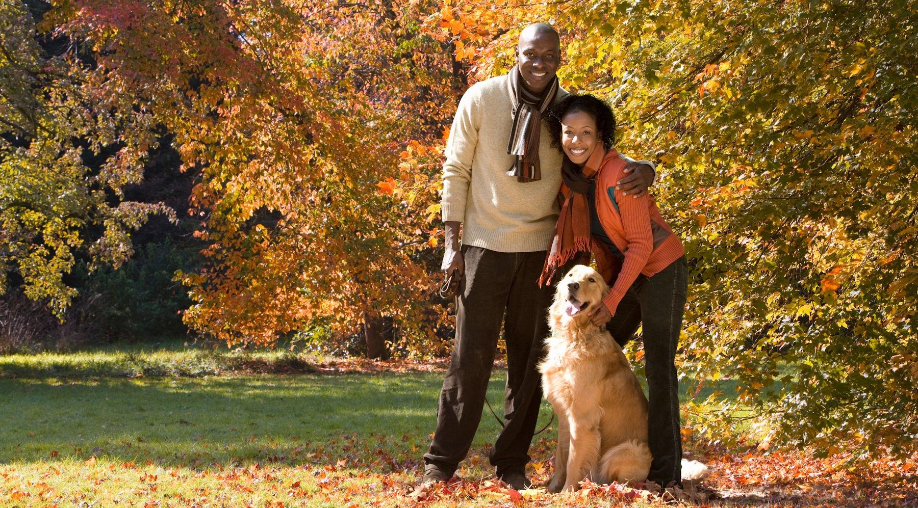 Planet Friendly Pest Control clients with their dog — safe for the whole pet-family